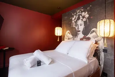 Un ou plusieurs lits dans un hébergement de l'établissement Geisha Studio design, romantisme et parking