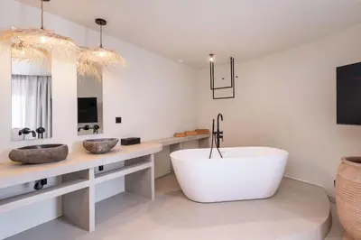 Salle de bains dans l'établissement Jardin Secret - Love Room avec Balnéo