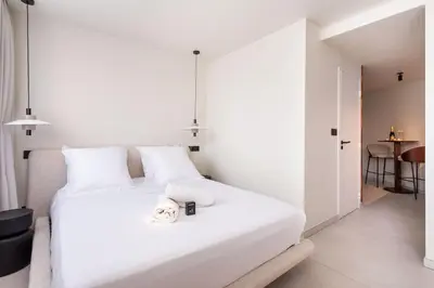 Un ou plusieurs lits dans un hébergement de l'établissement Wabi Sabi, Appartement Premium au Cœur de Lyon