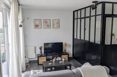 Coin salon dans l'établissement Comfortable apartment near transport