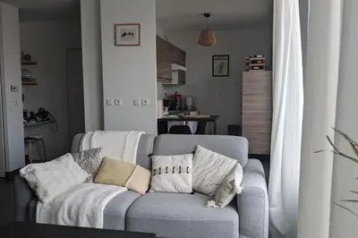 Coin salon dans l'établissement Comfortable apartment near transport