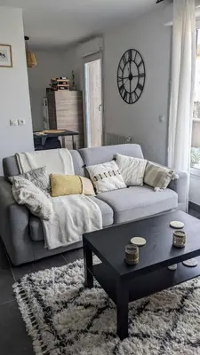 Coin salon dans l'établissement Comfortable apartment near transport
