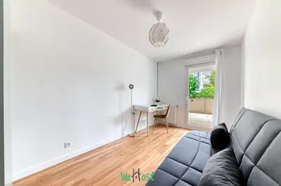 Coin salon dans l'établissement Large family apartment with parking in Lyon