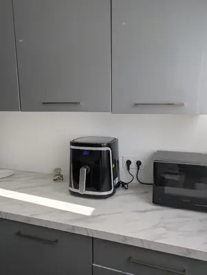 Cuisine ou kitchenette dans l'établissement Appartement joli proche de Lyon