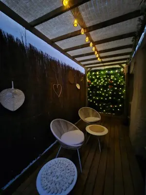 Coin salon dans l'établissement Casanova's Home Love