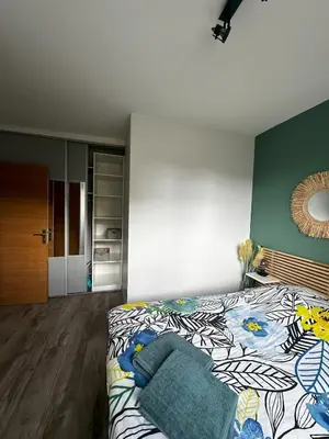 Un ou plusieurs lits dans un hébergement de l'établissement Art de Recevoir - Douce Escapade à Lyon 8 - Appartement Lumineux avec Terrasse & Climatisation