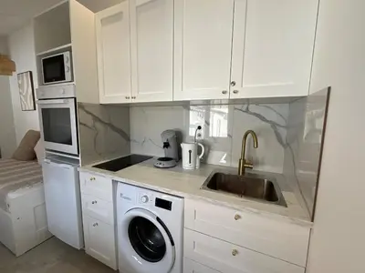 Cuisine ou kitchenette dans l'établissement La lodge de la gare