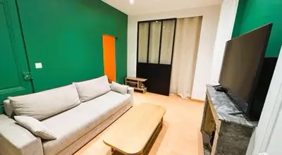 Coin salon dans l'établissement Appartement proche des transports