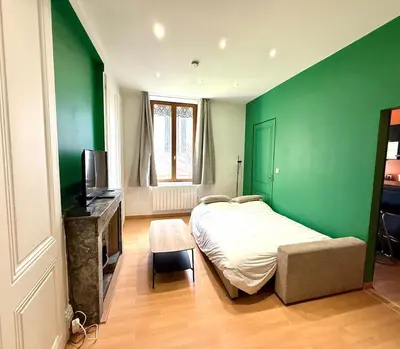 Un ou plusieurs lits dans un hébergement de l'établissement Appartement proche des transports