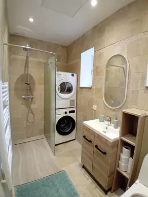 Salle de bains dans l'établissement Appartement charme ancien - confort moderne