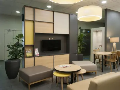 Télévision ou salle de divertissement dans l'établissement B&B HOTEL Lyon Ouest Tassin