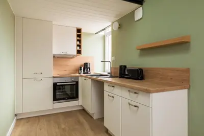 Cuisine ou kitchenette dans l'établissement Zest Sunny Charpennes