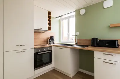 Cuisine ou kitchenette dans l'établissement Zest Sunny Charpennes