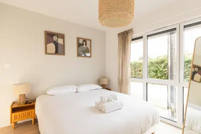 Un ou plusieurs lits dans un hébergement de l'établissement Zest Grand Bali Villeurbanne
