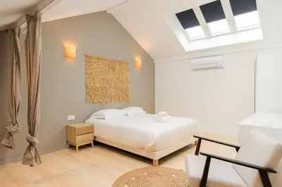 Un ou plusieurs lits dans un hébergement de l'établissement Zest Grand Bali Villeurbanne