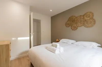 Un ou plusieurs lits dans un hébergement de l'établissement Zest Boheme Villeurbanne