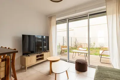 Télévision ou salle de divertissement dans l'établissement Zest Boheme Villeurbanne