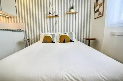 Un ou plusieurs lits dans un hébergement de l'établissement Small studio Parking - Metro B - Lyon Sud Hospital