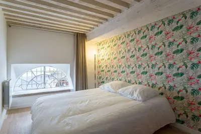 Un ou plusieurs lits dans un hébergement de l'établissement Smartstay Syrah - Centre-ville