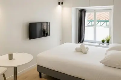 Un ou plusieurs lits dans un hébergement de l'établissement Ideally located studio Foch & Parc de la Tête d’Or