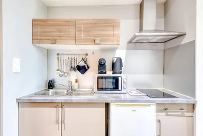 Cuisine ou kitchenette dans l'établissement Le calme urbain - Villeurbanne - Proximité Lyon