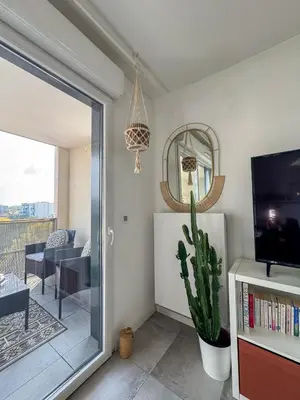Télévision ou salle de divertissement dans l'établissement Cactus Groupama Stadium-LDLC Arena-Eurexpo