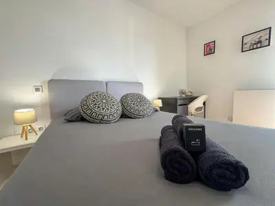 Un ou plusieurs lits dans un hébergement de l'établissement Cactus Groupama Stadium-LDLC Arena-Eurexpo