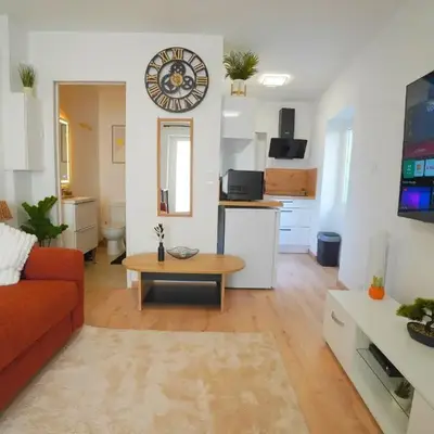 Studio neuf parking gratuit 15 minutes de Lyon
