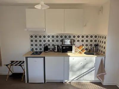 Cuisine ou kitchenette dans l'établissement Appartement cosy avec grand balcon à Bron
