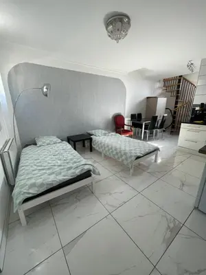 Un ou plusieurs lits dans un hébergement de l'établissement Escapade cosy proche Vienne