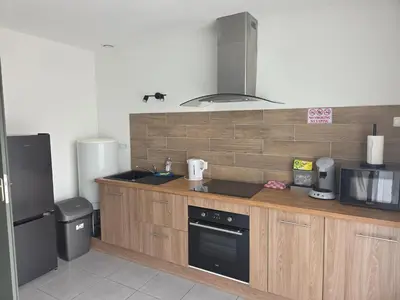 Cuisine ou kitchenette dans l'établissement charmant T2 la soie avec place de parking