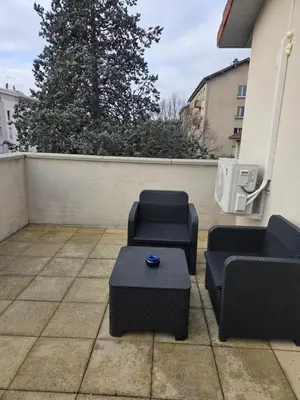 Coin salon dans l'établissement charmant T2 la soie avec place de parking
