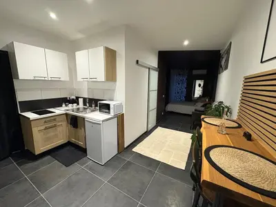 Cuisine ou kitchenette dans l'établissement Appartement Romantique Exceptionnel
