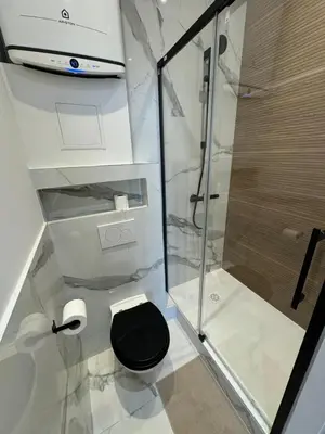 Salle de bains dans l'établissement Apple suite - studio Lyon