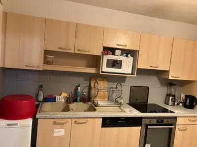Cuisine ou kitchenette dans l'établissement Le Nazareth