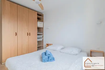 Un ou plusieurs lits dans un hébergement de l'établissement Appartement 2 chambres avec balcon aux portes de Lyon