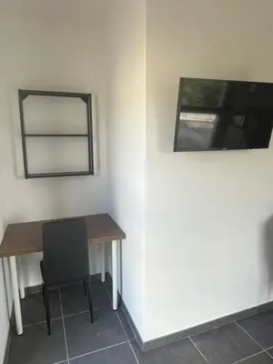 Télévision ou salle de divertissement dans l'établissement Ampuis centre - Appartement indépendant