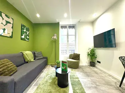 Télévision ou salle de divertissement dans l'établissement T2 Hypercentre proche metro - l'Atelier Bohème