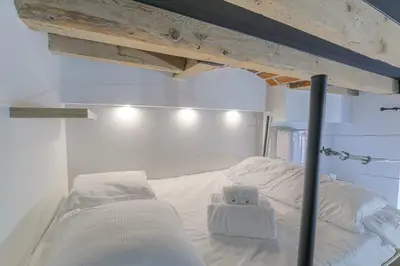 Un ou plusieurs lits dans un hébergement de l'établissement Cosy et Atypique duplex 5min métro Gare Oullins