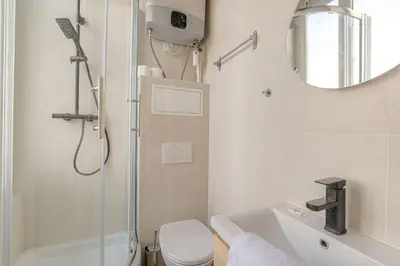 Salle de bains dans l'établissement Atypique et Cosy duplex 5min métro Gare Oullins