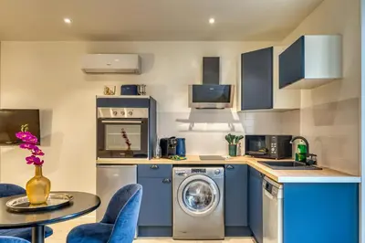 Cuisine ou kitchenette dans l'établissement La Parenthèse - T2 calme et climatisé
