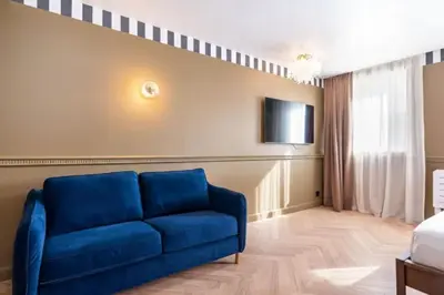 Télévision ou salle de divertissement dans l'établissement Studio Élégant-Une Escapade Raffinée en Plein Cœur de la Ville