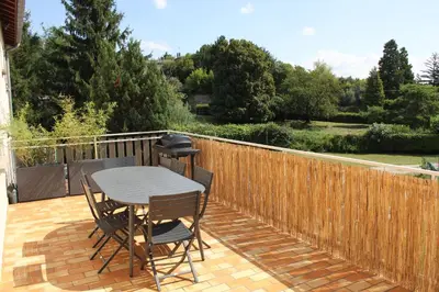 Balcon ou terrasse dans l'établissement Le Cocon des Allamandières