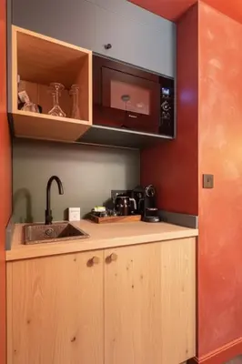 Cuisine ou kitchenette dans l'établissement Suite de charme-Expérience unique et raffinée