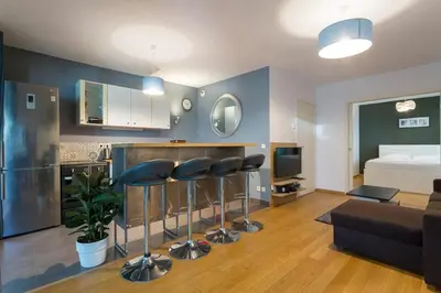 Cuisine ou kitchenette dans l'établissement Hamac Suites - Le confluence terrasse -4pers