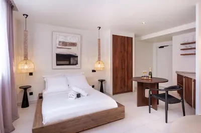Un ou plusieurs lits dans un hébergement de l'établissement Appartement de charme-Luxe, douceur et harmonie