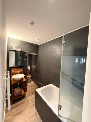 Salle de bains dans l'établissement Le cosy quai de saône