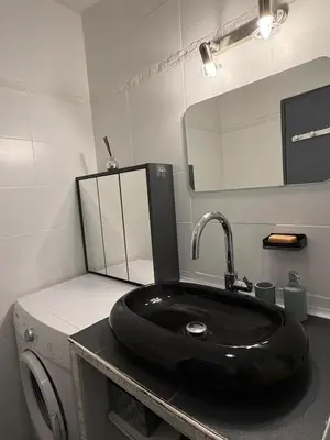 Cuisine ou kitchenette dans l'établissement Appartement chaleureux, proche gare et monuments
