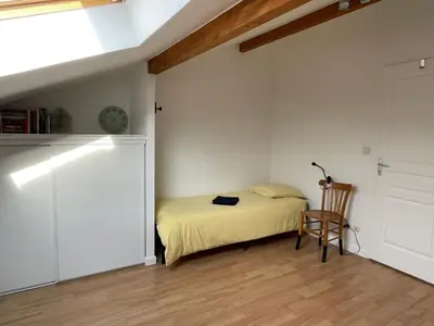 Un ou plusieurs lits dans un hébergement de l'établissement La Sereine - Appartement 2 chambres pour 4 personnes