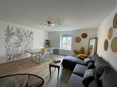 Coin salon dans l'établissement La Sereine - Appartement 2 chambres pour 4 personnes